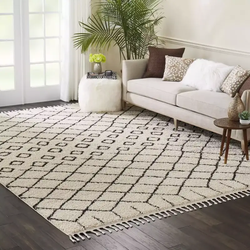 Cream geometric pattern area rugs.
