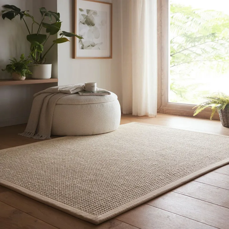 Textured beige sisal rug
